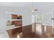 Open concept living and dining areas featuring hardwood floors and neutral paint scheme at 278 Tibton Circle, Myrtle Beach, SC 29588