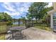 Patio with outdoor seating overlooking the pond, enclosed by a decorative fence at 278 Tibton Circle, Myrtle Beach, SC 29588