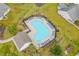 A sparkling community pool surrounded by lounge chairs and lush landscaping at 278 Tibton Circle, Myrtle Beach, SC 29588