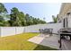 The outdoor patio area includes a dining table, grill, and privacy fence, perfect for relaxation and entertainment at 308 Golan Circle # A, Myrtle Beach, SC 29579