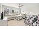 Bright bedroom with two beds, a crib, two windows, and overhead fan at 308 Golan Circle # A, Myrtle Beach, SC 29579