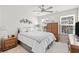 Well-lit bedroom features a queen bed with bedside tables and armoire at 308 Golan Circle # A, Myrtle Beach, SC 29579