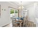 Inviting dining area with a stylish table, seating for six, and access to a patio at 308 Golan Circle # A, Myrtle Beach, SC 29579