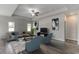 Cozy living room with contemporary decor, plush seating, and large windows offering natural light at 308 Mayflower Dr., Calabash, NC 28467