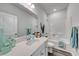 Light and airy bathroom with a white vanity, ample counter space, and a shower-tub at 312 Mayflower Dr., Calabash, NC 28467