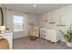 Charming Bedroom with crib, accent wall, decor and views of the lake at 356 Rookroost Circle, Conway, SC 29526