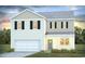 Charming two-story home with white siding, black shutters and an attached two-car garage at 356 Rookroost Circle, Conway, SC 29526