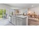 Open kitchen with granite countertops and views into the living and dining areas at 368 Rookroost Circle, Conway, SC 29526