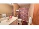 Bathroom with a sink, toilet, and shower/tub combination and tile flooring at 3700 Golf Colony Lane # 10C, Little River, SC 29566