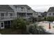 Exterior view of property from upper level featuring a pool at 3700 Golf Colony Lane # 10C, Little River, SC 29566