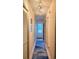 Hallway with tile flooring and a door to the outside at 3700 Golf Colony Lane # 10C, Little River, SC 29566