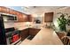 Well-lit kitchen features stainless steel appliances, lots of countertop space and dark cabinetry at 3700 Golf Colony Lane # 10C, Little River, SC 29566