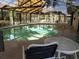 Indoor community pool with ample seating and clear water at 3700 Golf Colony Lane # 10C, Little River, SC 29566