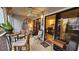 Relaxing screened-in porch with comfortable seating and tiled floors at 3700 Golf Colony Lane # 10C, Little River, SC 29566