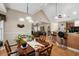 Open dining area with wood floors, plants, and ample natural light at 387 Foxtail Dr., Longs, SC 29568