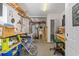 A garage interior space featuring shelving, tools, work benches and a sink at 387 Foxtail Dr., Longs, SC 29568
