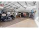 Spacious garage with a golf cart, car detailing station, and storage racks at 387 Foxtail Dr., Longs, SC 29568