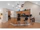 Kitchen with breakfast bar, ample cabinet space, and hardwood floors at 387 Foxtail Dr., Longs, SC 29568