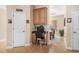 Cozy office nook features built-in desk, cabinets, and ample lighting, perfect for a home workspace at 387 Foxtail Dr., Longs, SC 29568