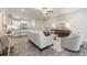 Inviting living room featuring modern decor and an open layout with kitchen views at 395 S Crow Creek Dr. # 1704, Calabash, NC 28467