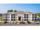 Apartment complex exterior view featuring neutral siding and screened porches at 395 S Crow Creek Dr. # 1709, Calabash, NC 28467