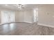 Living room features modern flooring, a ceiling fan, and natural light at 395 S Crow Creek Dr. # 1709, Calabash, NC 28467