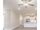 Cozy living area with connecting kitchen and stylish ceiling fan at 395 S Crow Creek Dr. # 1709, Calabash, NC 28467