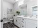 Bathroom featuring a white vanity, quartz countertops, and black hardware at 395 S Crow Creek Dr. # 1710, Calabash, NC 28467