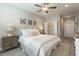 This bedroom has a ceiling fan, carpet, neutral walls, and a closet at 395 S Crow Creek Dr. # 1710, Calabash, NC 28467