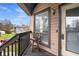 Outdoor balcony provides seating and a view of the surrounding landscape at 408 Tree Top Ct. # A, Myrtle Beach, SC 29588