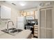 Functional kitchen featuring a double sink, modern appliances, and ample cabinet space for convenient storage at 408 Tree Top Ct. # A, Myrtle Beach, SC 29588