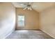 Bedroom featuring neutral walls, carpet, white trim, and a window with an outside view at 409 65Th Ave. N, Myrtle Beach, SC 29572