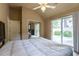 Comfortable bedroom featuring a mirrored closet and ceiling fan at 409 65Th Ave. N, Myrtle Beach, SC 29572