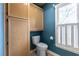 Toilet with a built-in cabinet space at 409 65Th Ave. N, Myrtle Beach, SC 29572