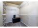 Spacious walk-in closet with ample shelving and a built-in media stand at 409 65Th Ave. N, Myrtle Beach, SC 29572