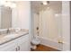 A bathroom featuring a granite vanity, toilet, and tiled shower/tub combination at 410 Melrose Pl. # 308, Myrtle Beach, SC 29572