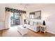 Comfortable living room with balcony access, cozy seating, and stylish coastal decor at 410 Melrose Pl. # 308, Myrtle Beach, SC 29572