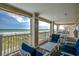 Spacious balcony with seating to enjoy scenic ocean views at 4103 N Ocean Blvd. # 304, North Myrtle Beach, SC 29582