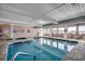 Inviting indoor swimming pool and jacuzzi with ample seating at 4103 N Ocean Blvd. # 304, North Myrtle Beach, SC 29582