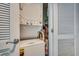 Image of a stacked washer and dryer with white cabinets at 4103 N Ocean Blvd. # 304, North Myrtle Beach, SC 29582