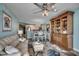 Open-concept living and dining area with ocean view, coastal decor, and hardwood floors at 4103 N Ocean Blvd. # 304, North Myrtle Beach, SC 29582