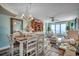 Open-concept living and dining area with ocean views, stylish furniture, and coastal decor at 4103 N Ocean Blvd. # 304, North Myrtle Beach, SC 29582