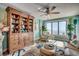 Cozy coastal living room featuring an ocean view, built-in shelves, and nautical decor at 4103 N Ocean Blvd. # 304, North Myrtle Beach, SC 29582