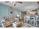 Bright living and dining area with coastal decor, ocean view, and comfortable seating at 4103 N Ocean Blvd. # 304, North Myrtle Beach, SC 29582