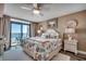 Serene main bedroom with balcony, ocean view, and coastal-themed bedding at 4103 N Ocean Blvd. # 304, North Myrtle Beach, SC 29582