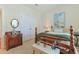 Bedroom with neutral walls, furniture, and double door closet at 419 Broadmoor Dr., Murrells Inlet, SC 29576