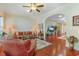Inviting living room with hardwood floors, comfortable seating, and an open layout to promote relaxation and socializing at 419 Broadmoor Dr., Murrells Inlet, SC 29576
