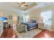 Serene primary bedroom featuring a tray ceiling, plush bedding, and tranquil decor for restful nights at 419 Broadmoor Dr., Murrells Inlet, SC 29576