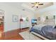 Bright main bedroom with tray ceilings, neutral walls, and wood floors at 419 Broadmoor Dr., Murrells Inlet, SC 29576