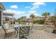 Inviting outdoor patio featuring comfortable seating, a fire pit, and lush landscaping for perfect relaxation at 419 Broadmoor Dr., Murrells Inlet, SC 29576